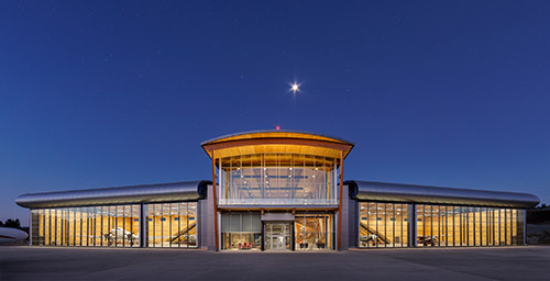 THE MUSEUM IS MADE OF TIMBER AND SHAPED LIKE AN AIRCRAFT